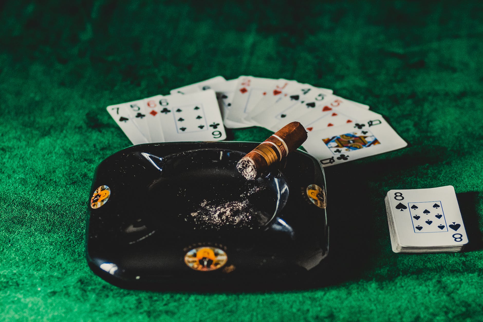 brown tobacco on black ashtray